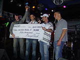 Adam and Ofir present Marty with the $50,000 check!