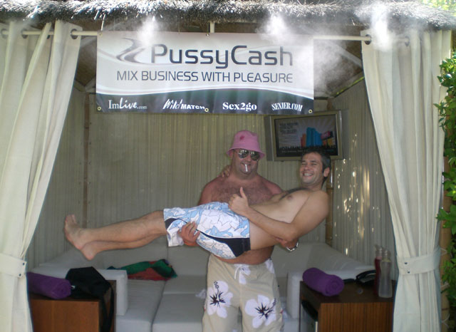 Adam whoops it up with a webmaster in the cabana